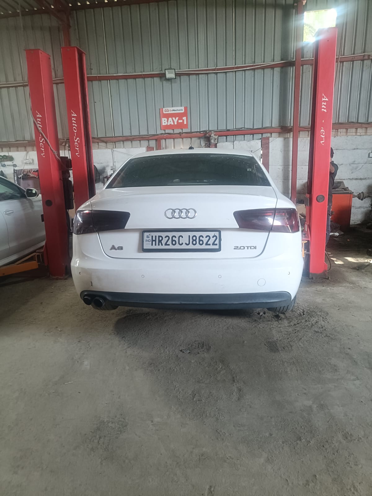 Audi vehicle service work at a workshop