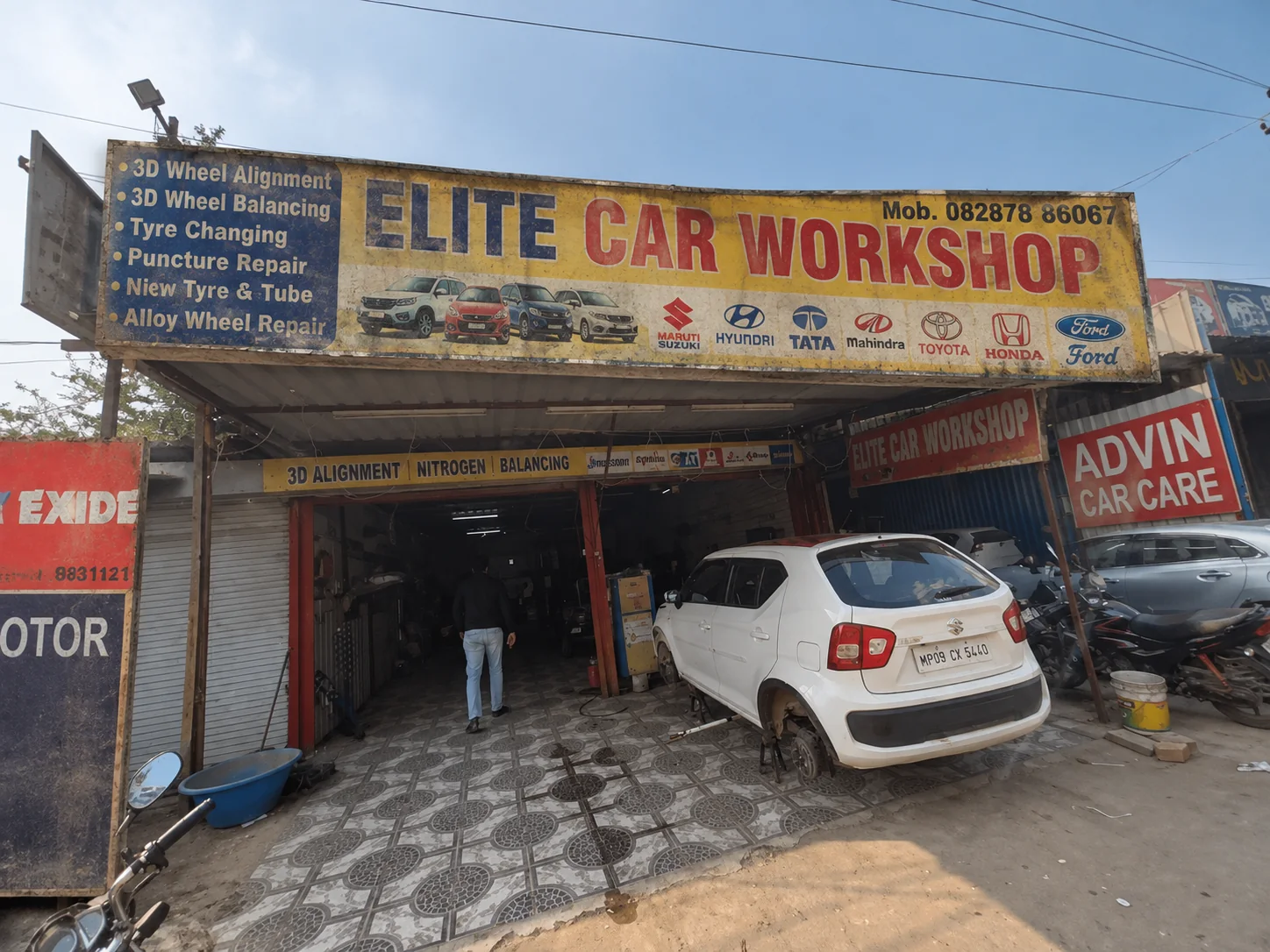 Elite Car Workshop storefront at Sector 18, Old Delhi Gurugram Road, Gurugram, Haryana, IN, 122015