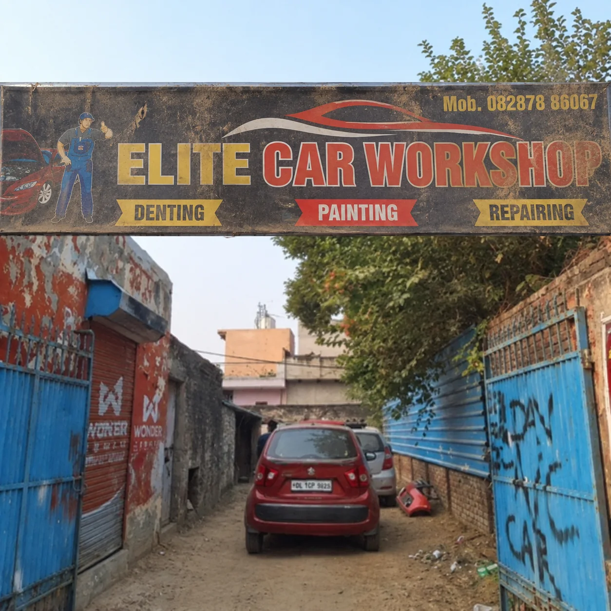 Elite Car Workshop storefront at JX6F+52P, Nanda Enclave, Block B, New Gopal Nagar, Najafgarh, Delhi, IN, 110043